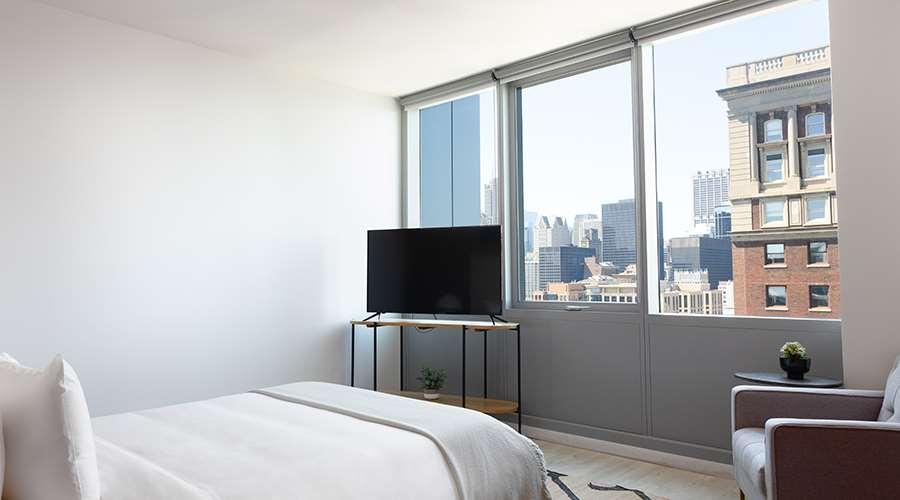Sentral Michigan Avenue Aparthotel Chicago Rom bilde A bedroom at 100 East 14th Street